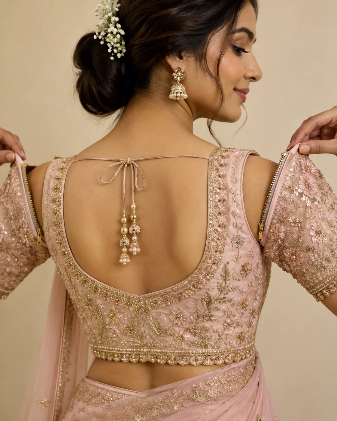 Pink bridal blouse back detail, an example of a design suited to detachable-sleeve construction